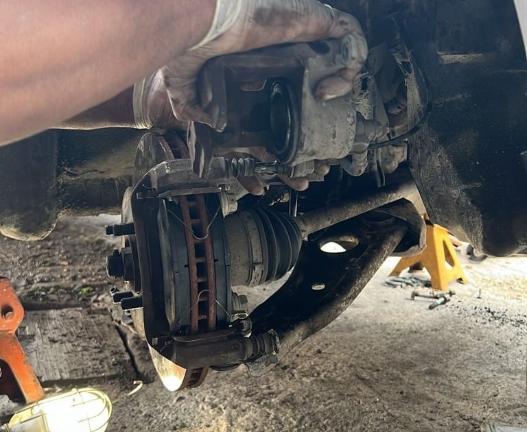 Mechanic doing brake change