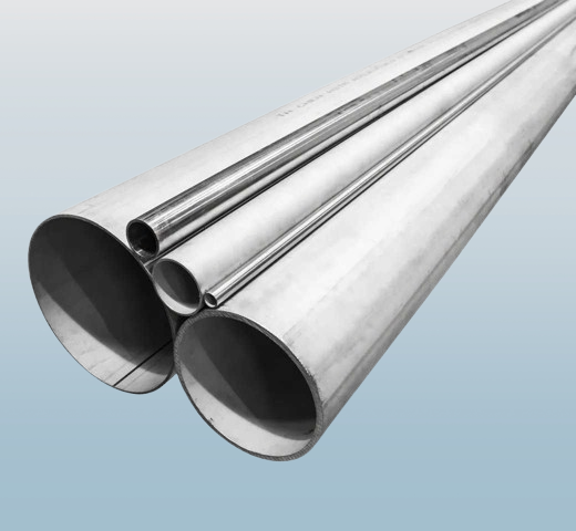 Industrial round stainless steel pipes and metal tubing in various diameters for construction.