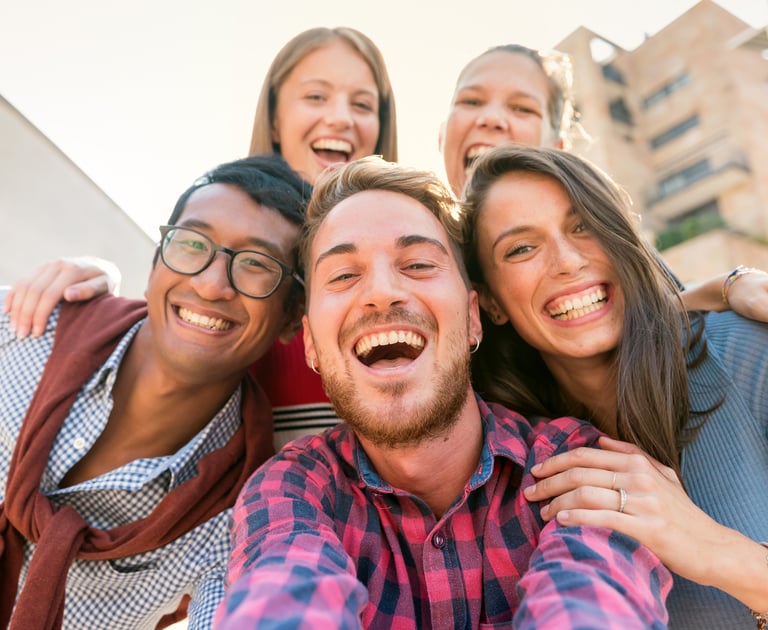 Group of friends outside laughing