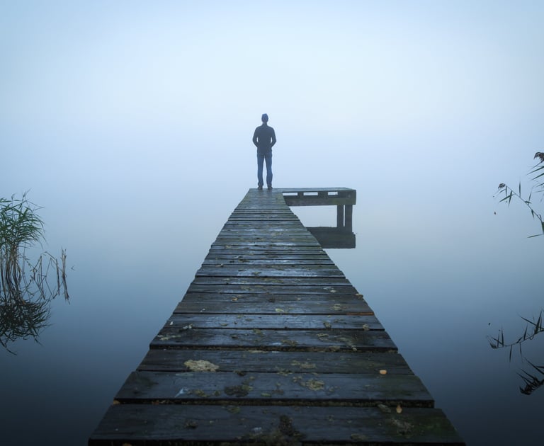 Man in contemplation, representing men’s mental health.