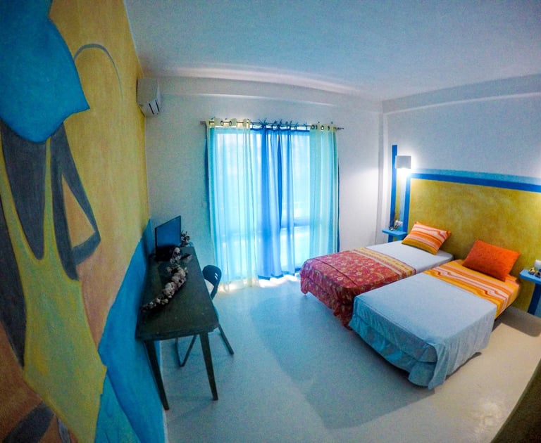 Chambre d’hôtel à Maio, Cap-Vert avec climatisation et confort essentiel