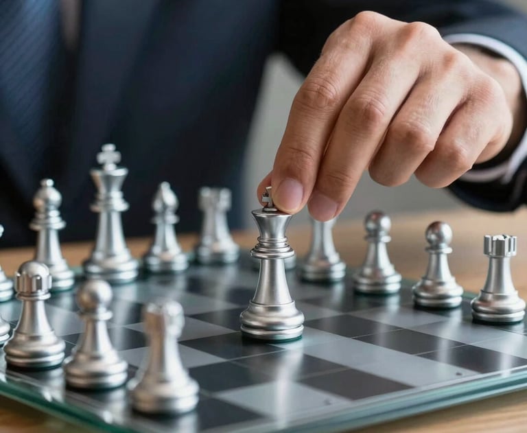 A high-end photograph of a professional's hand placing a silver chess piece on a glass board. Represents strategy, foresight, and calculated business moves.