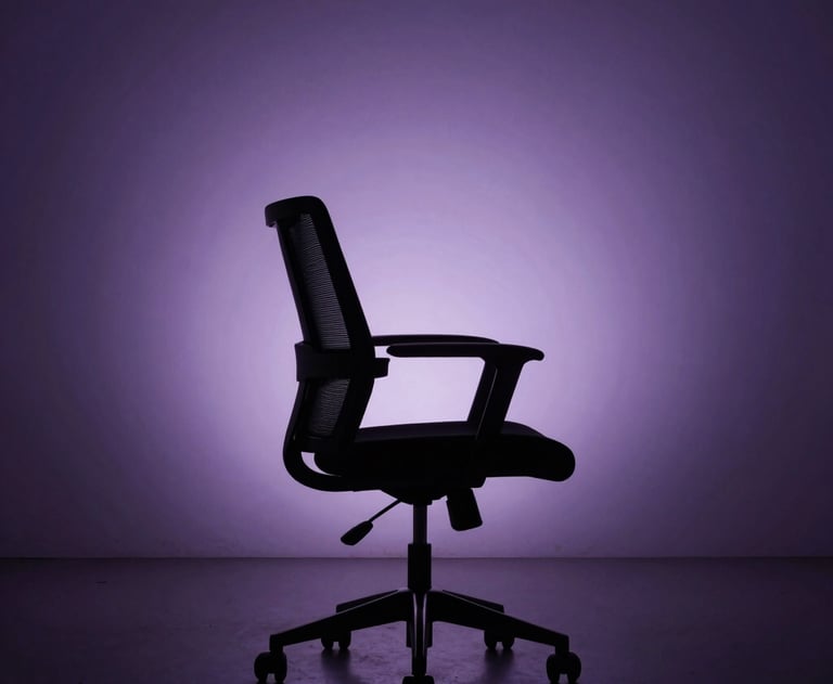 A minimalist photograph of a high-tech studio chair in a dark room, silhouetted against a purple-lit wall. The scene is quiet, professional, and sophisticated.
