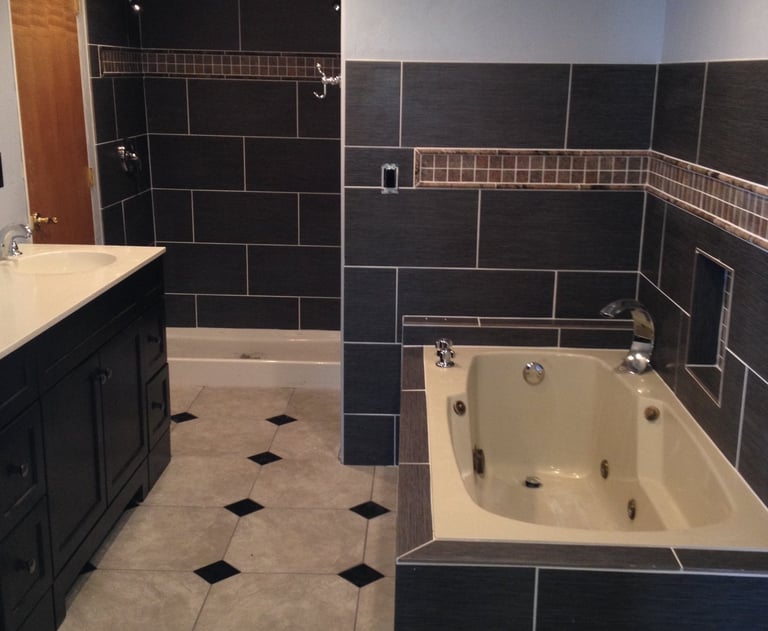 “Finished bathroom addition in Fraser”. - An unused space completely transformed. 