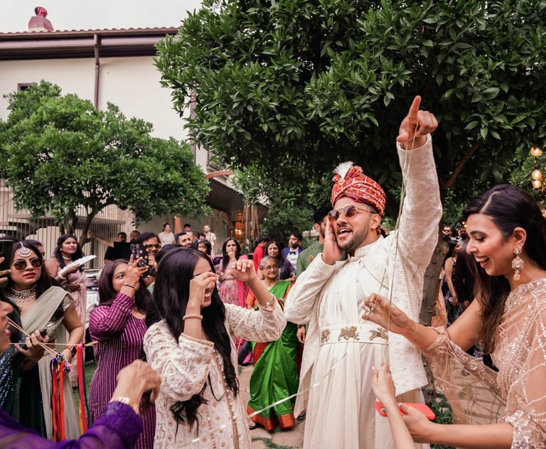 a man and woman dancing at a wedding