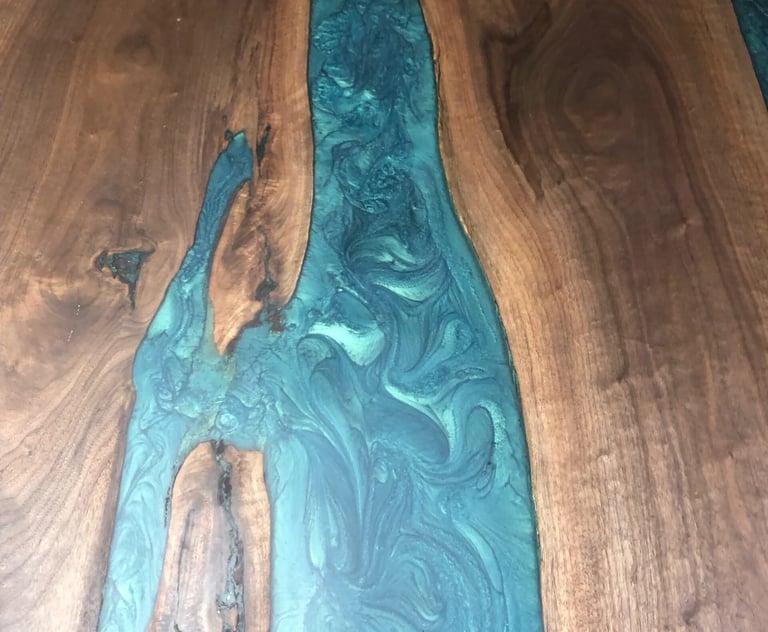Black walnut boardroom table with mermaid dust metallic epoxy — top view, custom epoxy colour option