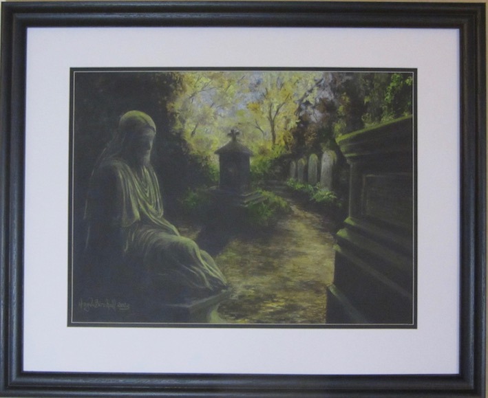 The fading light of day hits the folds of clothing on the monument in Highgate Cemetery. Soft pastel