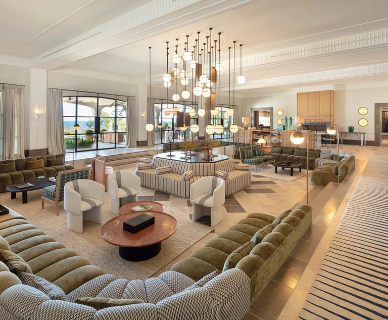 Salon at Villa La Gratitud with chandeliers and custom furnishings