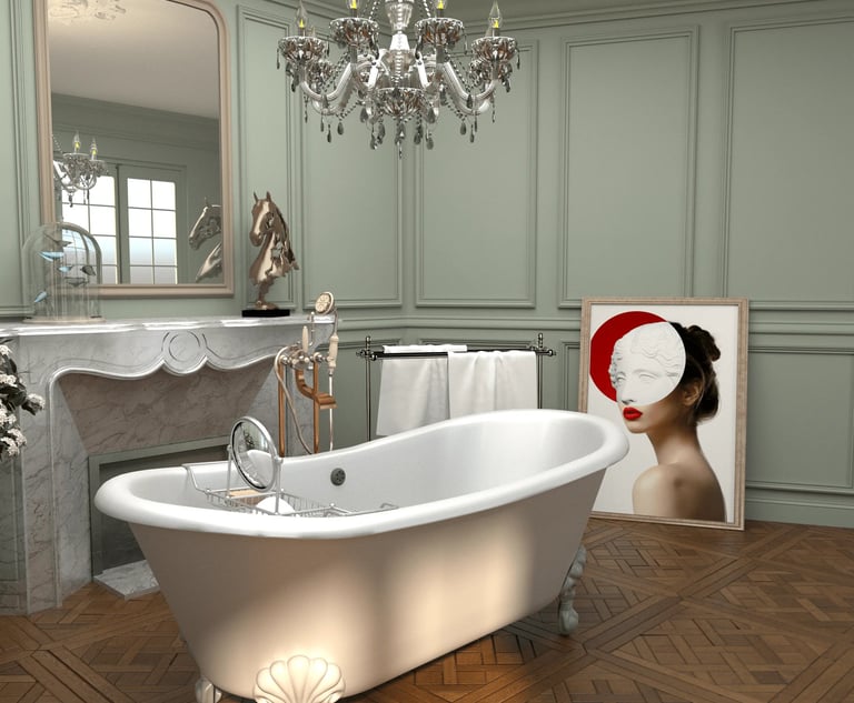 Baignoire ilot sur parquet d'origine dans un appartement haussmannien, Nina Poma Studio.