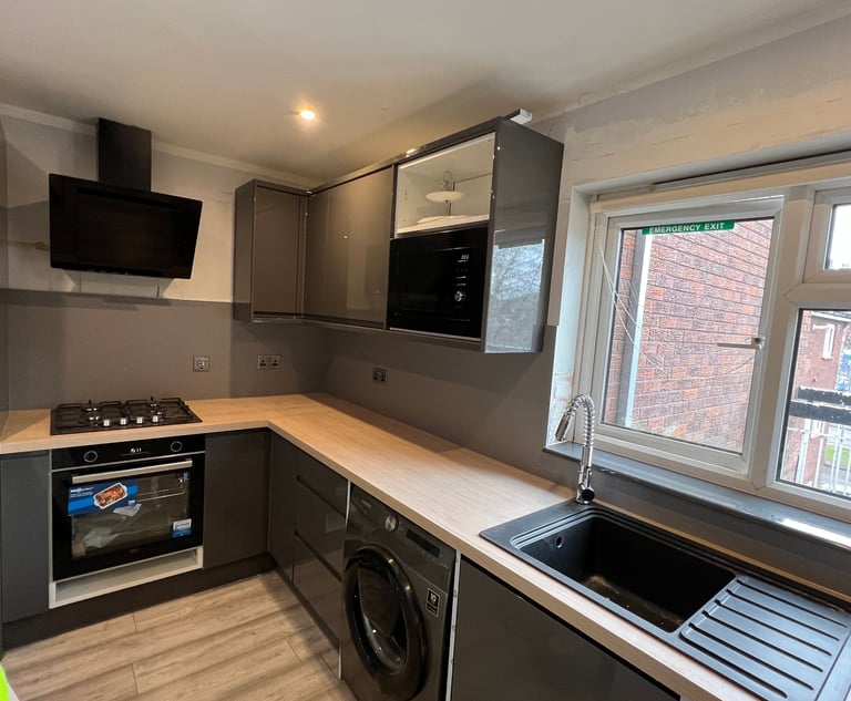 Kitchen installation cabinets and worktop sink, oven, washingashine