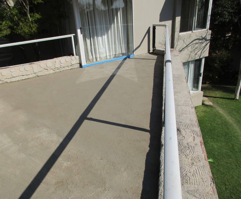 Screed in state of cure at bedroom sliding door end. Fourways Gardens, Sandton
