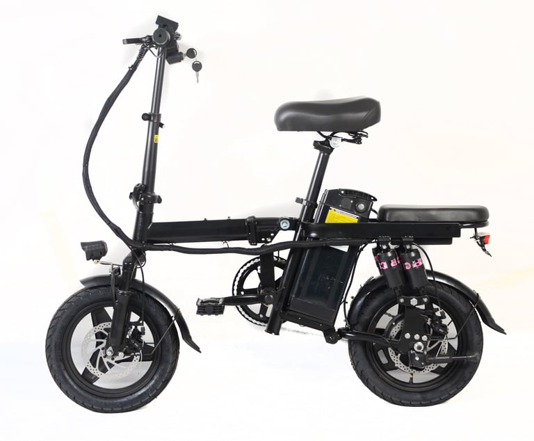 a black and white electric bike with a black seat