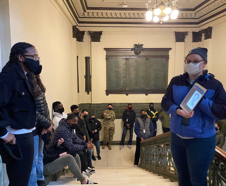 Dr. Hooton, left, with students at Cullum Hall at West Point. Black history and memory walking tour