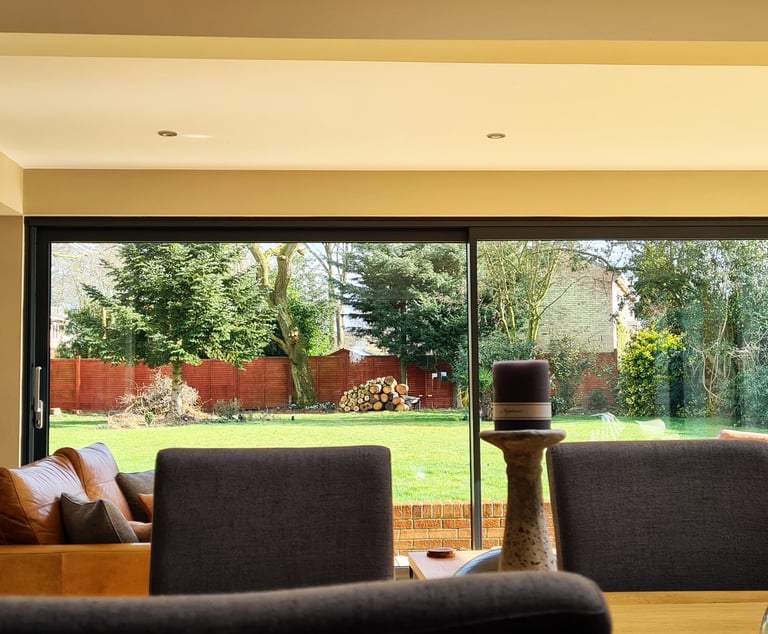 Modern lounge renovation in Bury St Edmunds designed by Donani Design to maximise natural light.