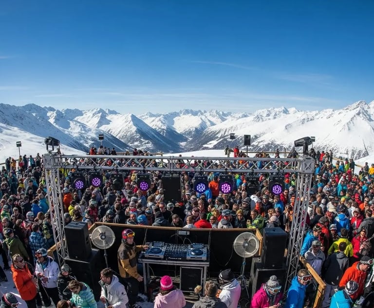 Skier’s perspective showing fresh first tracks on a groomed slope in Val d’Isère.