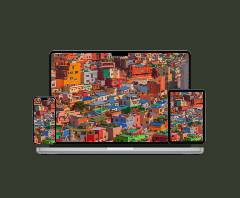 a laptop computer and a laptop with a cityscapeople on it