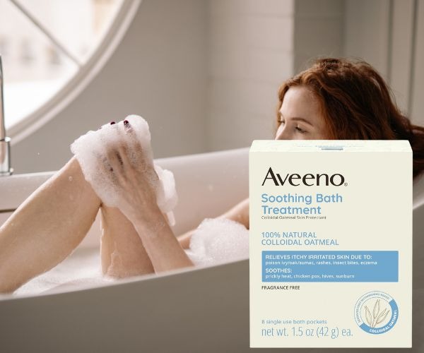 woman taking a bath using Colloidal Oatmeal