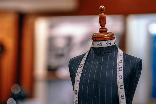 a dressform with measuring tape