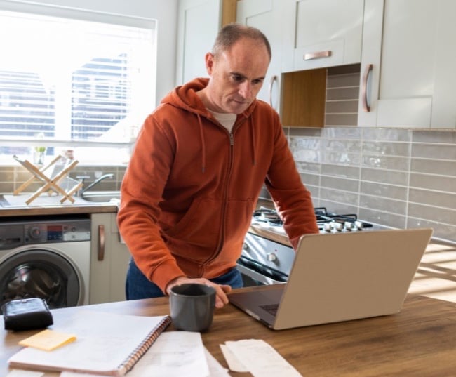 Builder reviewing project costs
