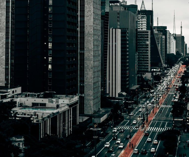 a city street scene with a view of a city