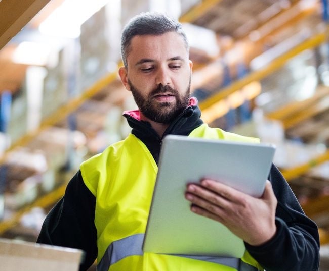 man using project management software