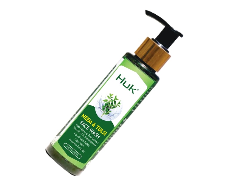 a bottle of green tea tree oil