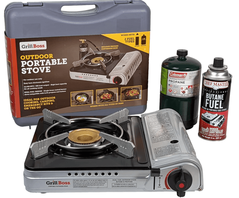 a stove top stove with a case and a bottle of water