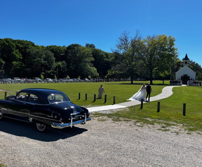 Felt Mansion, Saugatuck, Michigan deliver bride and father of bride to chapel