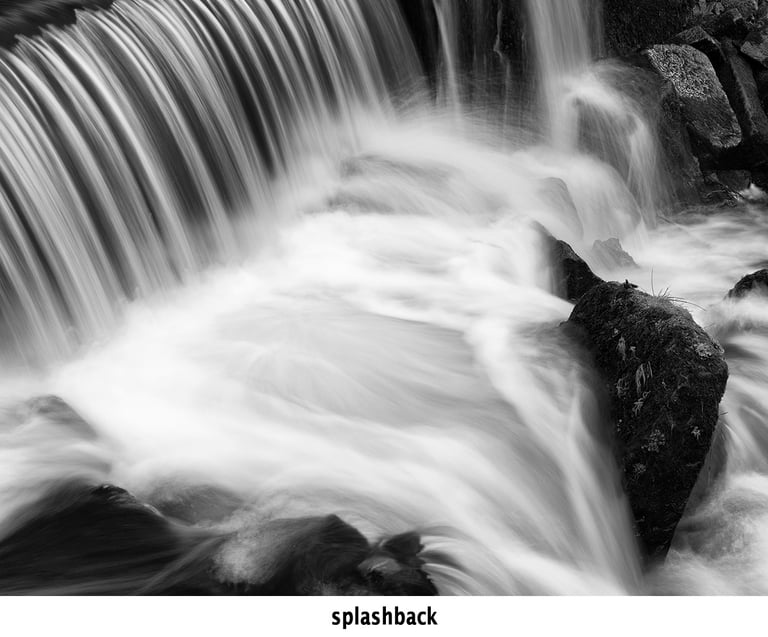 an abstract pattern created by a small waterfall