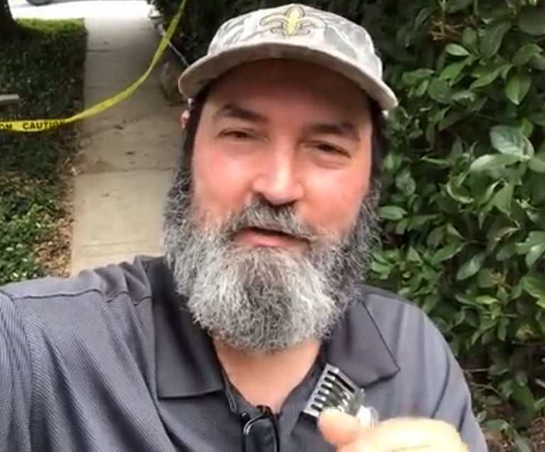 JP ready to remove bees from a tree