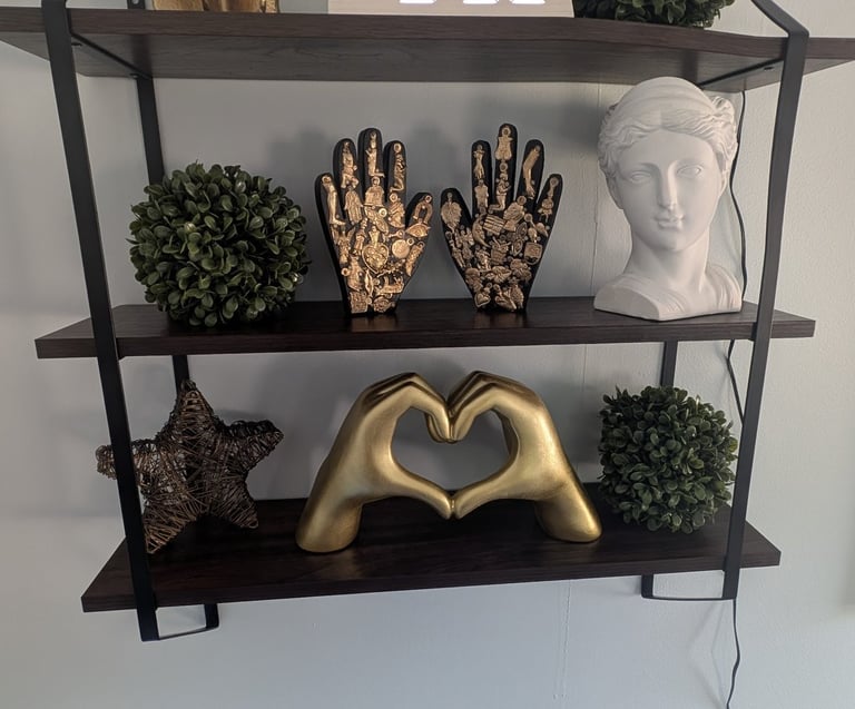 a shelf with massage therapy decor