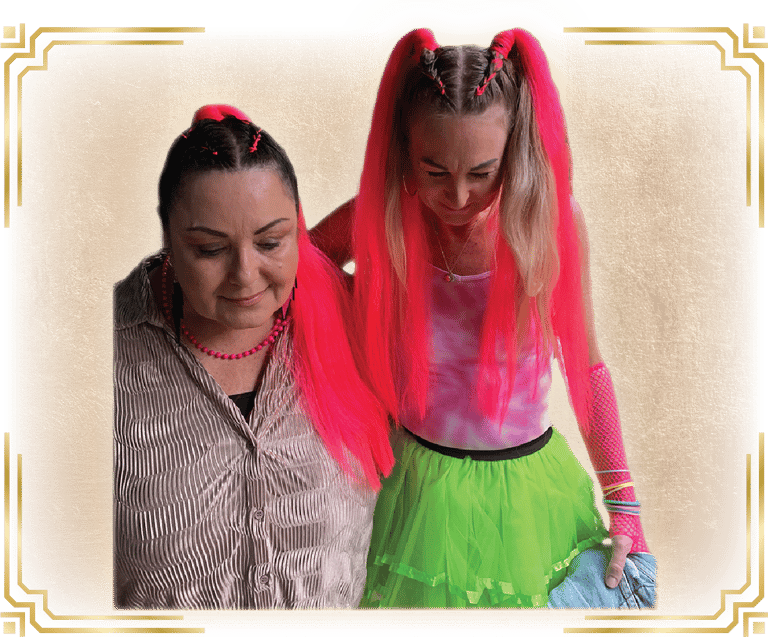 2 women with cornrows into pony tails