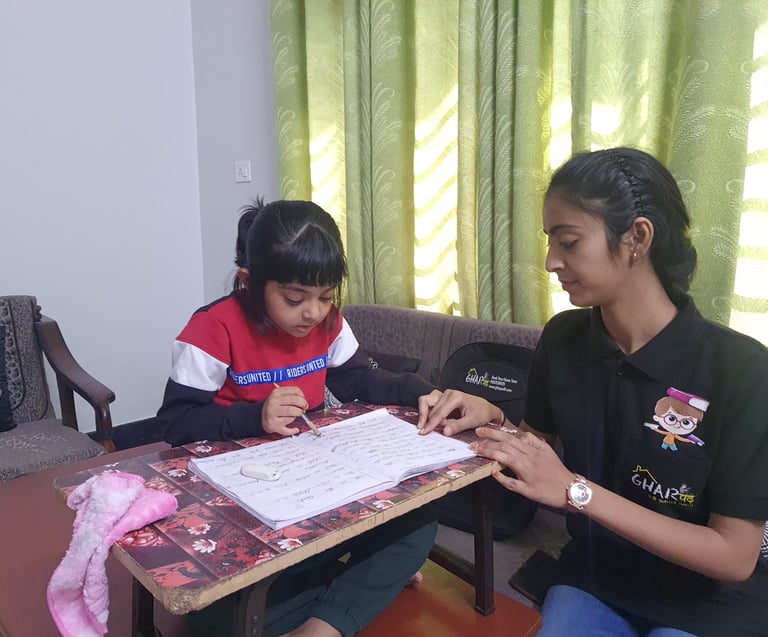 a home tutor from gharpadh teaching a student