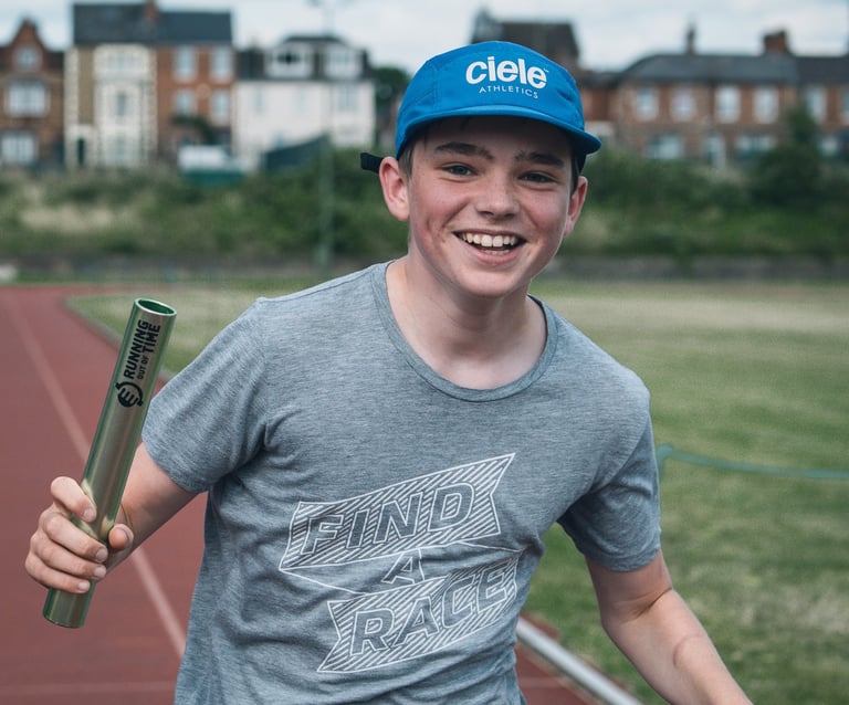 photo of a young runner at the athletics track