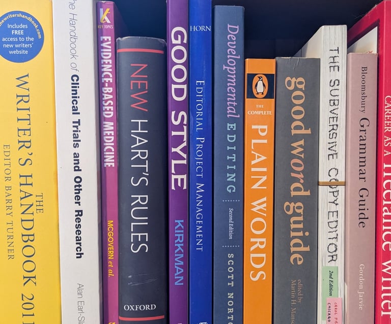 Editorial books on a shelf