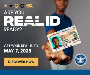 a man holding a Real ID