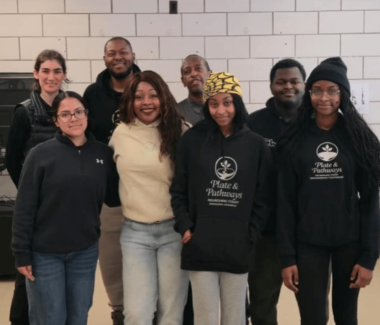 Plate & Pathways volunteer group photo from the 2025 Winter Wrap-Up food and clothes giveaway