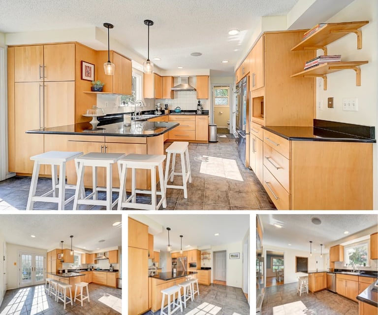 Bright modern kitchen with wood cabinets, large island, bar stools, pendant lights, and stainless steel appliances
