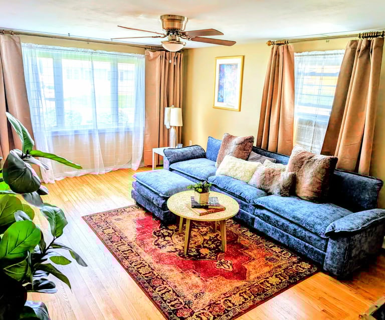 Spacious living room at Cape on Chatham with a large, comfortable sectional sofa.