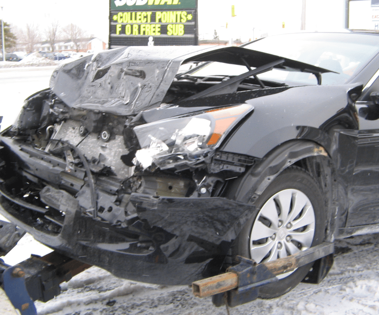 Fender Bender on towing dolly, by New Tecumseth Towing