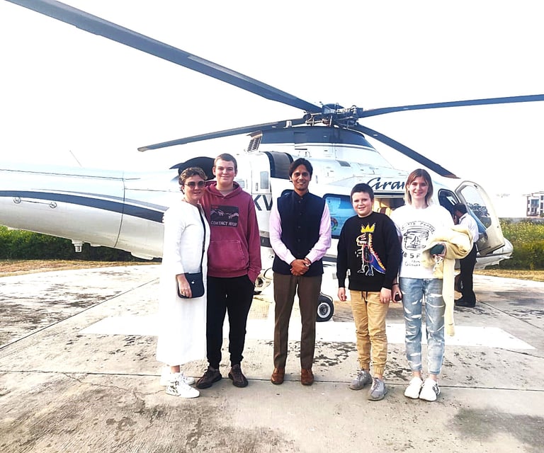 Muzammil (in the center) leading an exotic tour of Agra and Jaipur for a family travelling on their Private Jet