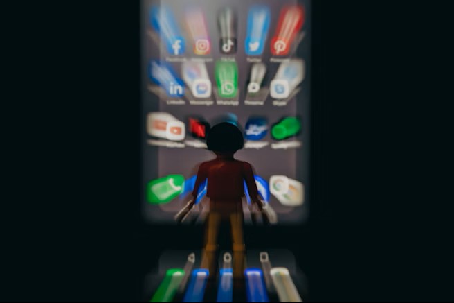 a person standing in front of a cell phone