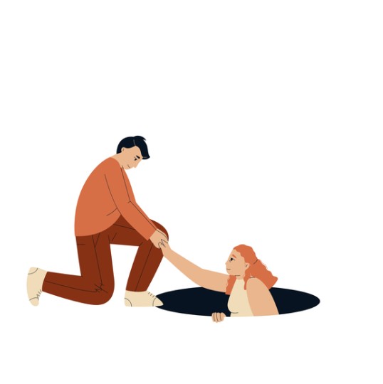 a young man helping pull a woman out of a hole in the ground