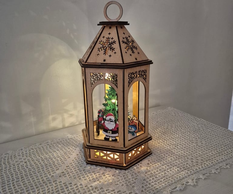 A uniquely handmade and painted Christmas lantern, A stunning table piece.