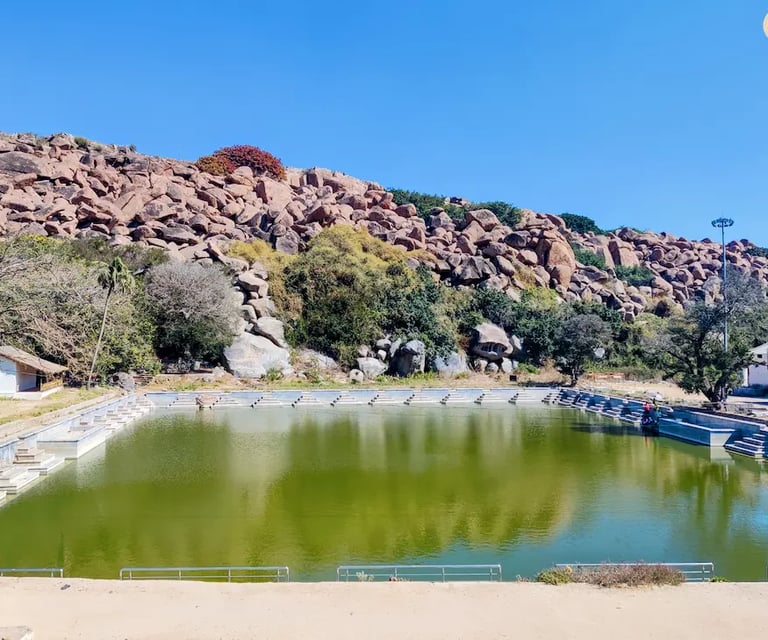 Pampa Sarovar, the sacred lake in Kishkindha, Hampi, surrounded by serene landscapes.
