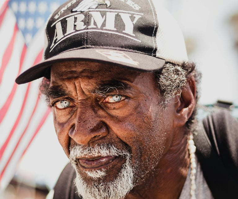a man with an army hat on