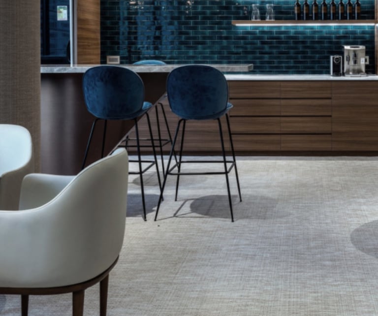 a modern looking bar with a bar stool and a bar stool