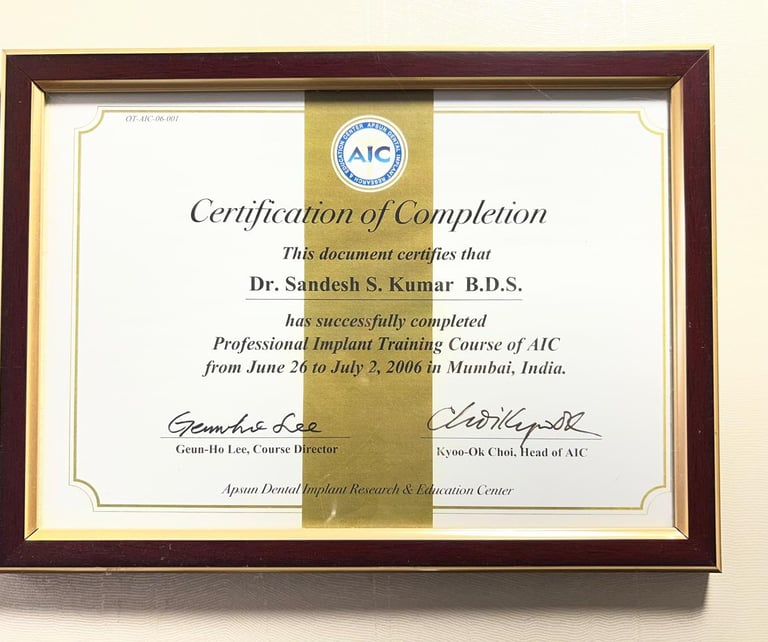 Dr. Sandesh S. Kumar's B.D.S. Professional Implant Training Course certification of completion from AIC Mumbai.