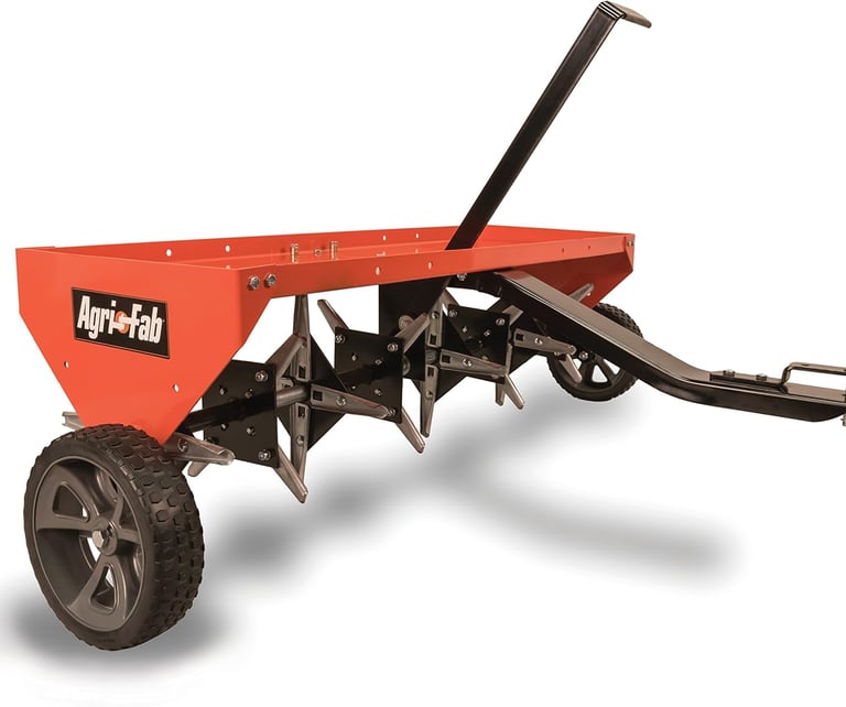 Agri-Fab tow-behind plug aerator with sharp steel tines for lawn soil aeration.