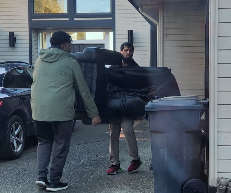 Best affordable reliable movers in Edmonton lifting furniture couch. Fast efficient movers delivery